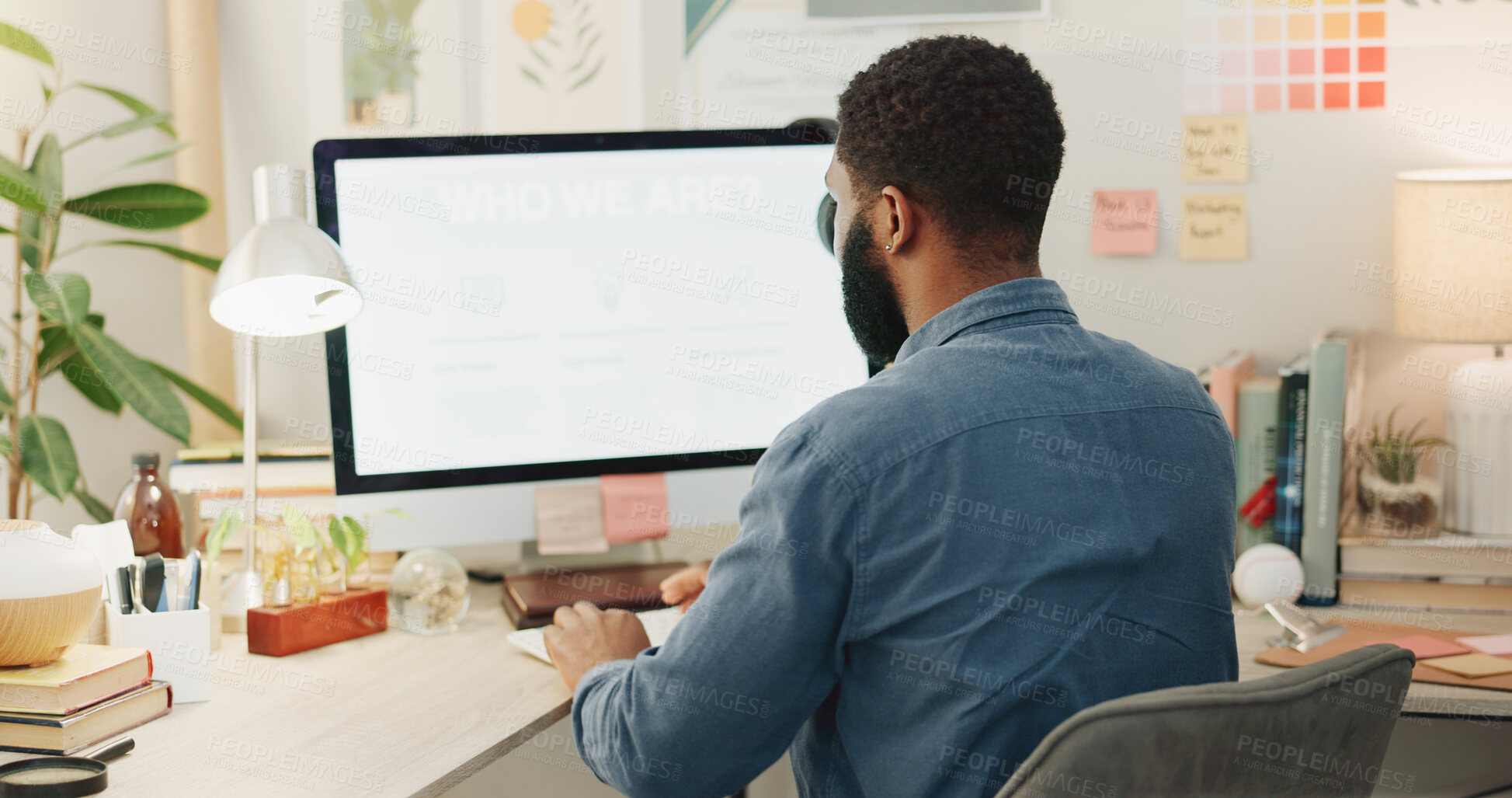 Buy stock photo Night, desk and a black man with a notebook for planning of work goals, target or ideas for a project. Workspace, strategy and an African businessman writing for deadline inspiration or notes