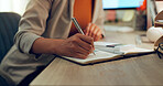 Accounting, hand and calculator or writing in a notebook for finance budget, cost or tax math. Closeup of an accountant woman at desk with notes for calculation, bookkeeping or investment in business