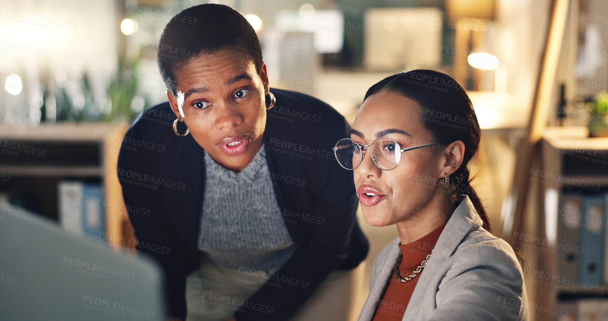 Buy stock photo Computer, discussion and business people in office at night working on a legal case with deadline. Explain, technology and professional women corporate lawyers doing research on desktop in workplace.