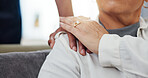 Homecare, empathy or hands of caregiver with senior woman in house with kindness, comfort or support closeup. Shoulder, sorry and nurse with old person at home with understanding, trust or compassion