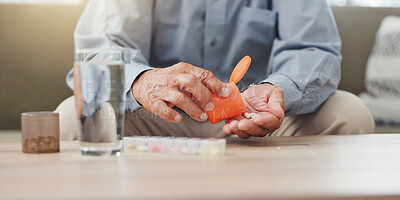 Hands, elderly person and pills on table with water, medicine for health and treatment for sick patient at home. Pharmaceutical drugs, supplements or antibiotics with daily routine for healthcare