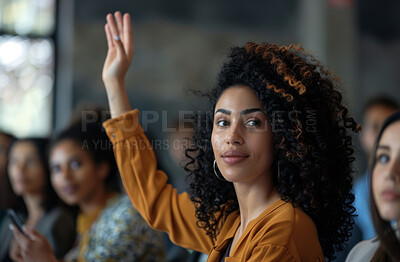 Raised hand, business and woman volunteer or voting at meeting, conference or trading seminar. Office, confident and female at convention, workshop gathering, or asking a question in workplace