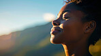 Fitness, woman and breathing of fit person outdoor in nature, mountains and blue sky background for yoga wellness, meditation and zen. Closeup, female and breathing for peace, freedom and mindfulness