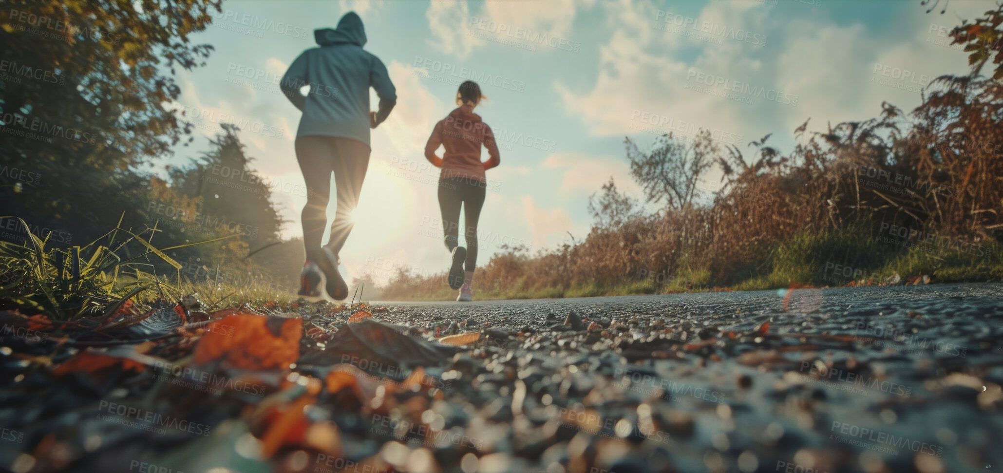 Buy stock photo Group, running and athlete exercise on an open road for marathon competition, training or jogging workout together. Low angle, sunrise and sport shoes mockup for challenge, activity or team support