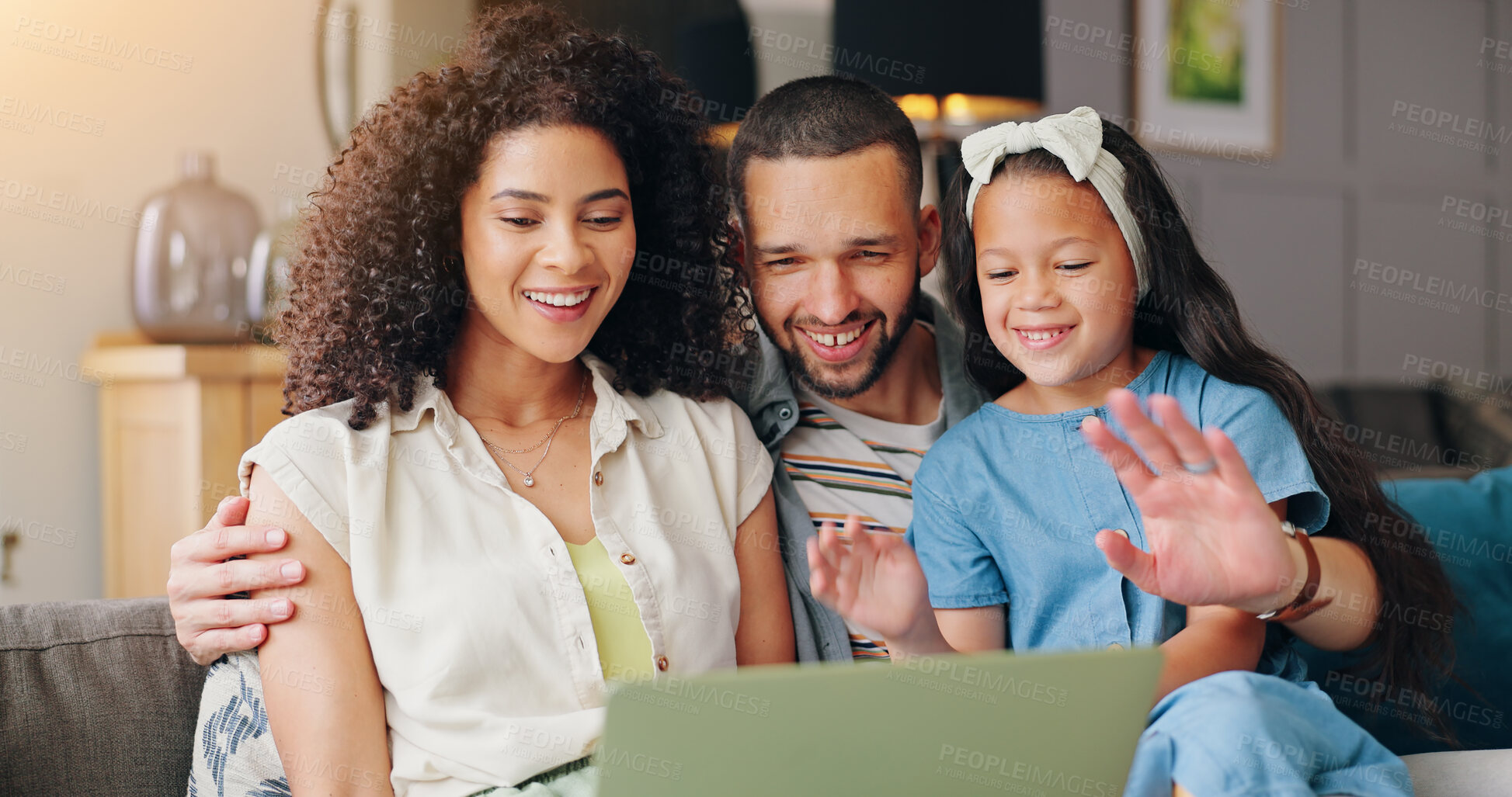 Buy stock photo Parents, girl and video call with laptop, sofa and wave hello with smile, contact and communication on web app. Father, mother and daughter with computer on living room couch with chat in family home