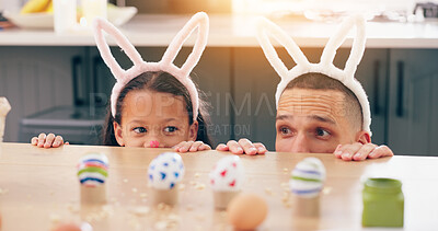 Buy stock photo Child, father and easter with eggs, happy or thinking at table for game, festive holiday or celebration. Dad, kid and bunny ears for rabbit costume, ideas or playful for love, bonding and family home