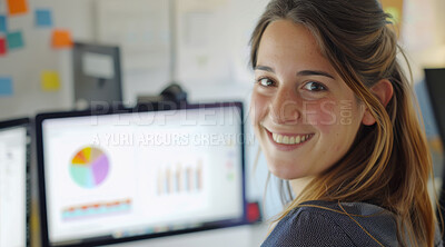 Computer, business and woman in an office for marketing strategy, data analysis and infographics on screen. Happy, confident and American sitting at her desk for finance, professional and technology