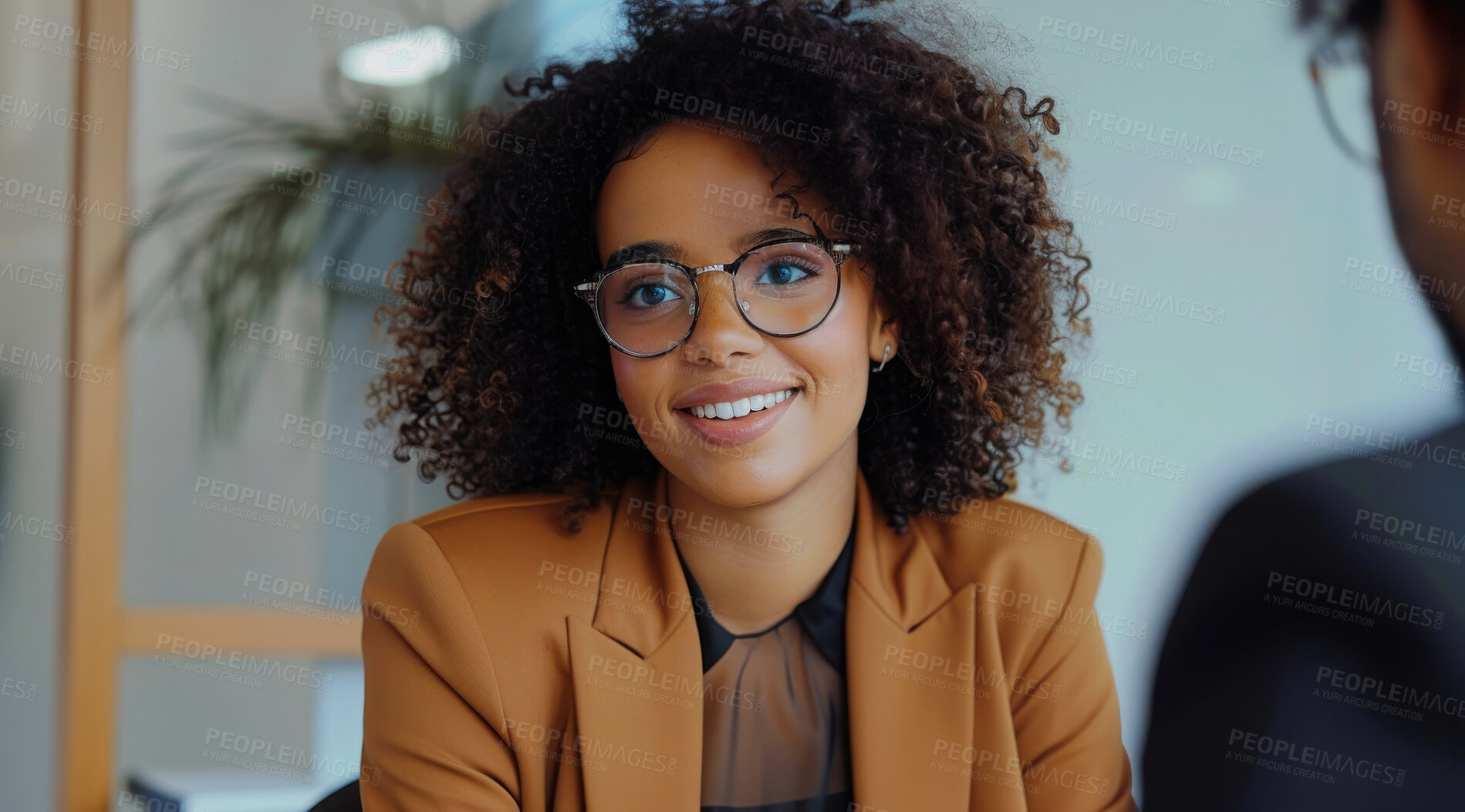 Buy stock photo Young, corporate business and woman in an interview or meeting for job, career or promotion. Confident, African American and female professional smiling for new position, recruitment and work