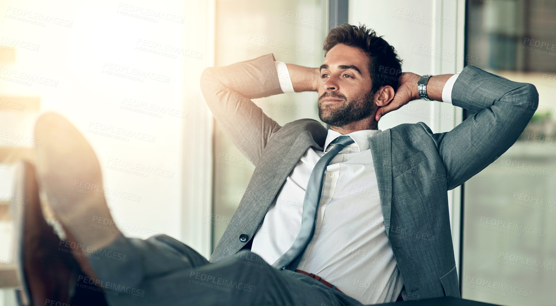 Buy stock photo Relax, stretching and businessman with hands behind his head after finished project in the office. Rest, calm and happy professional male employee on a break with a success task in the workplace.