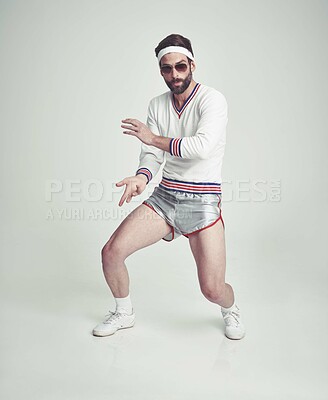 Buy stock photo Man, portrait and vintage tennis gear in studio for retro fashion with 80s look, workout and sports. Sunglasses, training and exercise for fitness style, unique and gen x person for old school feel