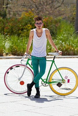 Buy stock photo Portrait, bike and a hipster man in the city for eco friendly travel, sustainability or carbon neutral transportation. Fashion, retro and a cyclist standing with a vintage bicycle in an urban town