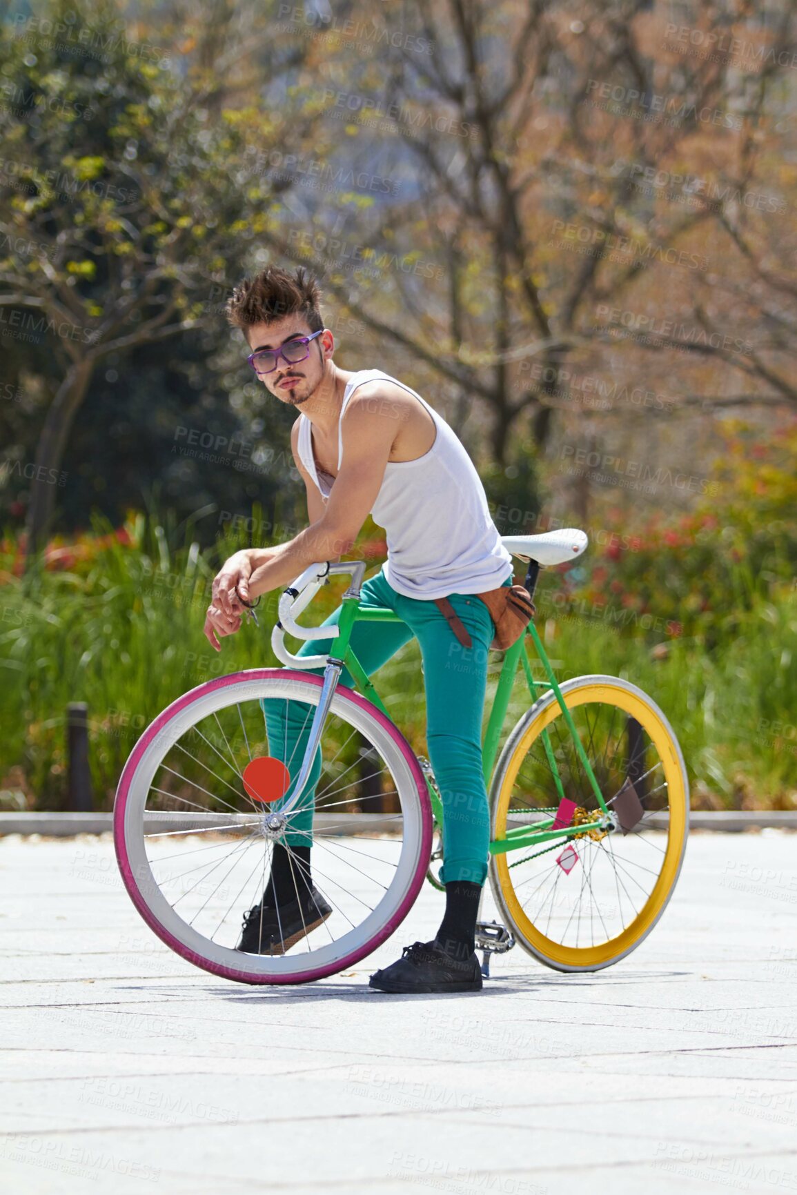 Buy stock photo Cool man, fashion and portrait with bicycle in city, outdoor and in sunshine with unique personality. Young gen z guy, funky trend and hipster cycling on bike in summer, urban town and with attitude