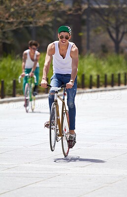 Buy stock photo Men, summer and students in street, bicycle and sustainable transport for sunshine, freedom and wheelie. Young gen z people, retro bike and outdoor together in road for travel, university or campus