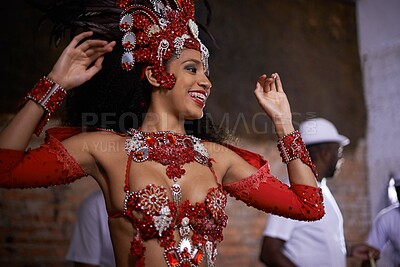 Buy stock photo Happy woman, samba dancer and performance with costume for tradition at carnival or festival. Face of female person or exotic performer with band for culture or dancing at party or concert in Rio