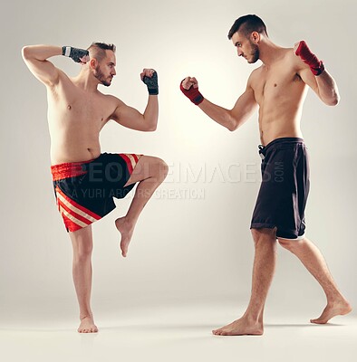 Buy stock photo Challenge, mma and men fight in competition, exercise or training body in studio isolated on a white background. Sports, martial arts and people sparring in battle for action or workout for fitness