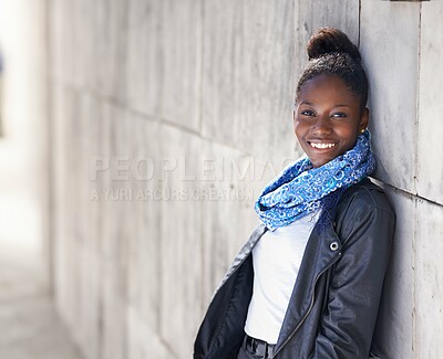 Buy stock photo Portrait, urban fashion and black woman at wall with smile, graffiti and mockup standing at street art. Happiness, youth and happy face of gen z model in African city with streetwear and sunshine.