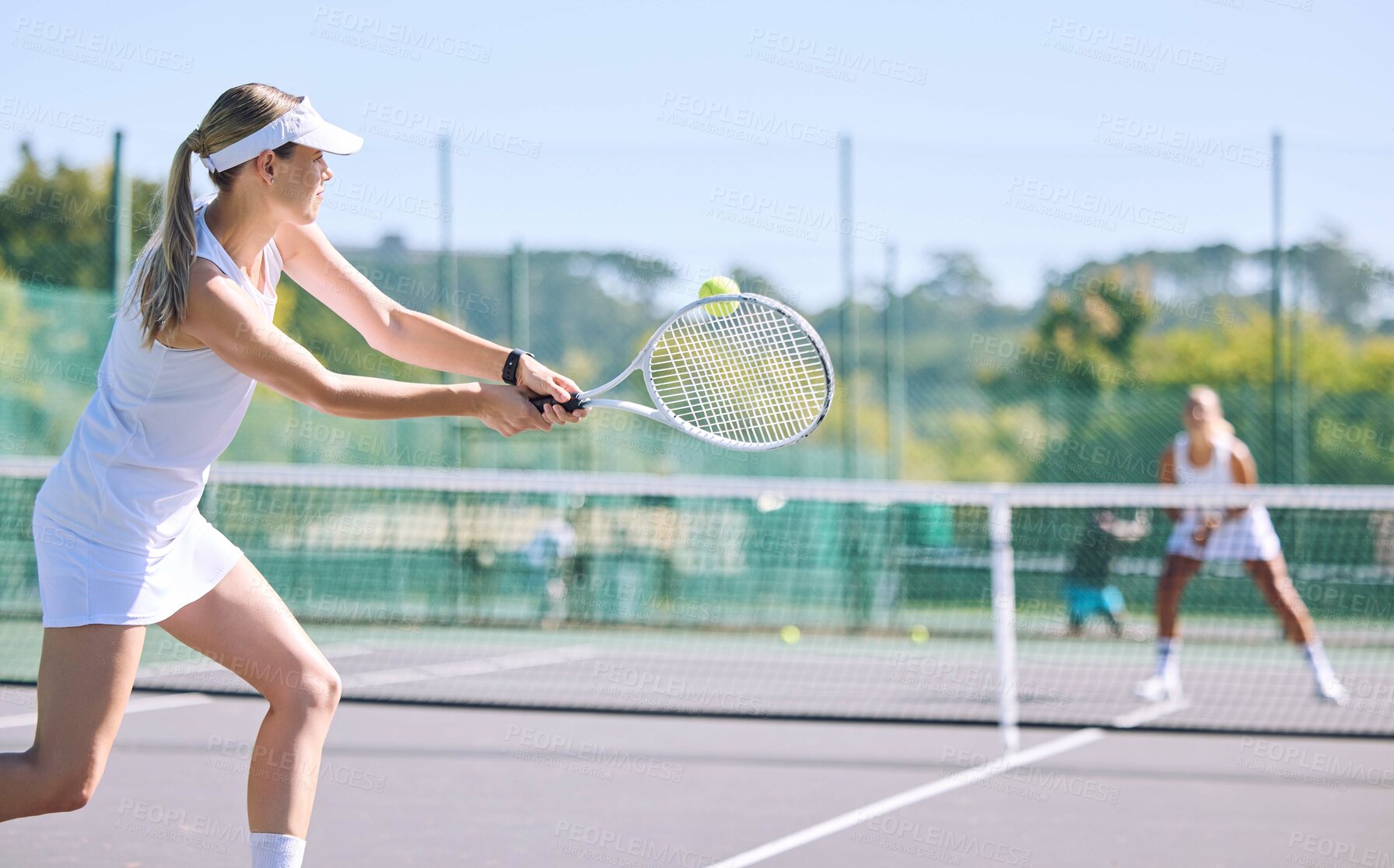 Buy stock photo Sports and active tennis player hitting ball with racket equipment during a competitive match or hobby activity on a court. Athletic, sporty and fit woman playing in a tournament game with sportswear