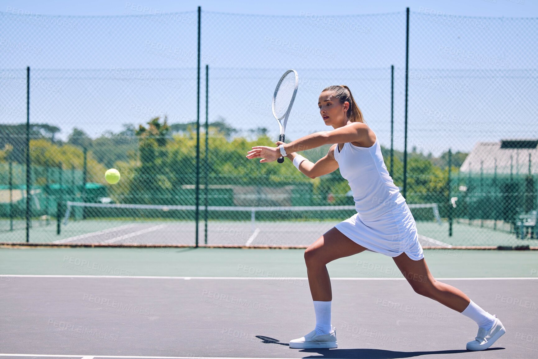 Buy stock photo Fitness, exercise and sport with training tennis player playing competitive match at a tennis court. Woman athlete practicing cardio in a game. Young, strong player enjoying action and competition