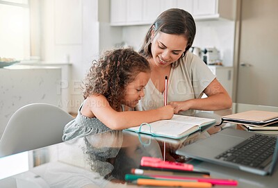 Buy stock photo Family, education and distance learning mother helping her child student with her school work. Smiling mom working with and teaching her young girl, studying on kitchen table at home