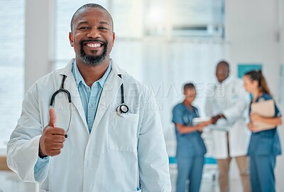 Buy stock photo Thumbs up, doctor and portrait of black man with smile for medical help, insurance and trust in hospital. Healthcare, thank you sign and face of male health worker for service, consulting and care