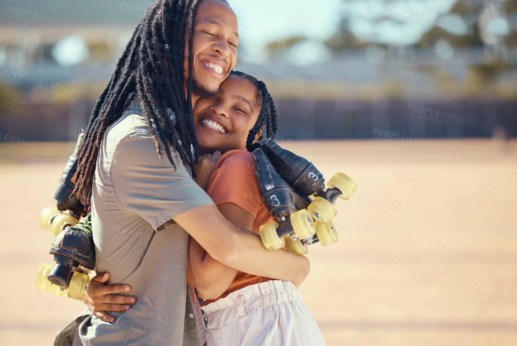 Buy stock photo Health, exercise and friends roller skating, hug and bonding at a skate park, happy and cheerful. Black woman and trendy man sharing a sweet moment of friendship while training and enjoying hobby  