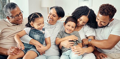 Buy stock photo Portrait, children with grandparents in a big family as mother and father hugging boy on the sofa or couch. Dad mom and young kids happy to enjoy bonding with lovely grandmother and old man at home 
