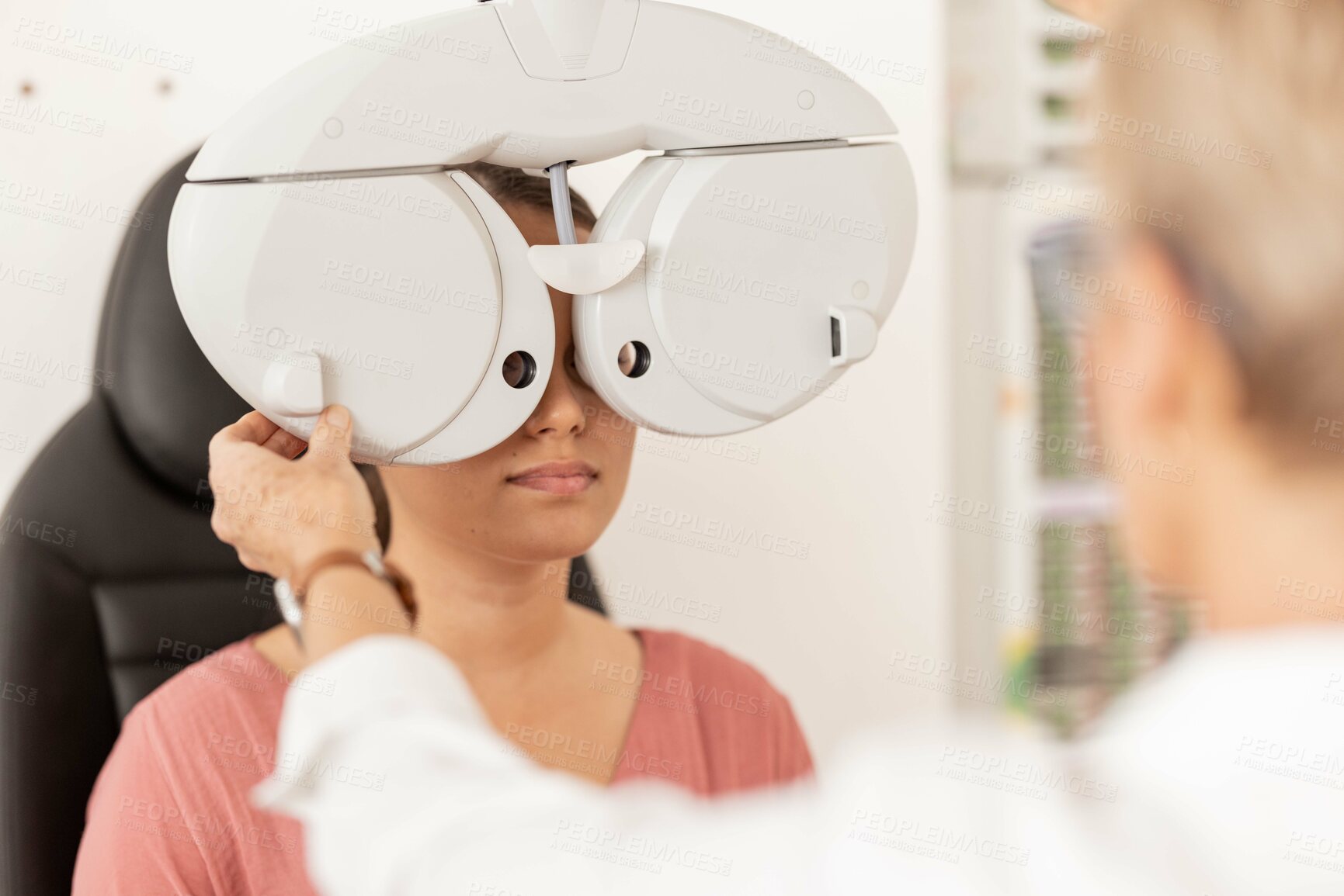 Buy stock photo Vision, consulting and lens exam of woman with expert eyecare professional in glaucoma testing clinic. Ophthalmologist, doctor and machine with girl patient at consultation appointment.

