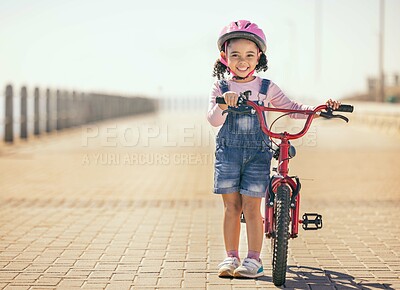Buy stock photo Black girl, learning and bike for portrait, smile or park path with sunshine, safety or happiness. Kid, happy and bicycle in training, outdoor or childhood development in summer in street with helmet