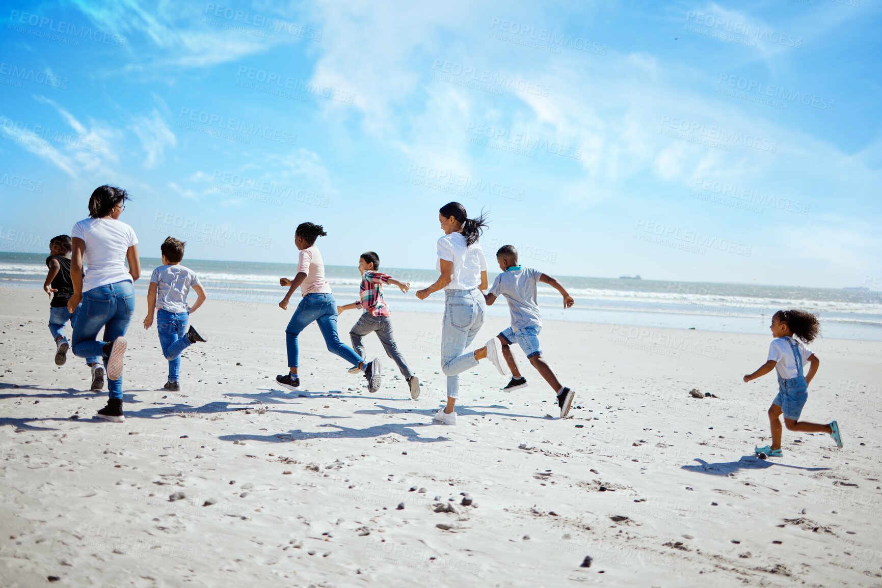 Buy stock photo Running family, beach and adoption kids with happiness, bonding and sand with speed on summer vacation. Women, children and happy workout for group on holiday by ocean with diversity, love and care