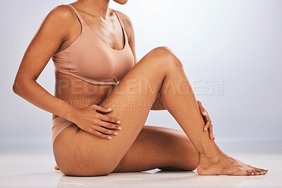 Buy stock photo Legs, feet and body, black woman and beauty, skincare epilation and pedicure isolated on studio background. Health, wellness and grooming, waxing or laser hair removal, dermatology and cosmetic care