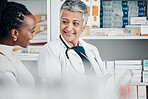 Pharmacy, service and black woman with pharmacist for advice, help and treatment or medicine choice. Customer, senior woman and discussion for pharmaceutical  information, questions and guidance