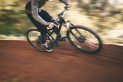 Buy stock photo Bike, cycling, and fast with man in nature for training, extreme sports and motion blur. Workout, race and speed with cyclist in forest park for performance, fitness challenge and adventure