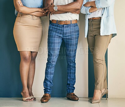 Buy stock photo Business people, legs and arms crossed at wall, human resources and recruitment employees. Hr, feet of man and women standing in office with confidence in teamwork, opportunity and professional group