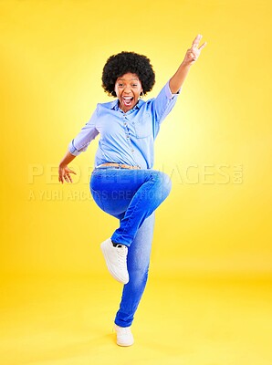 Buy stock photo Excited, happy and a woman in studio with fun energy, positive attitude and action. Portrait of African model person isolated on yellow background for freedom dance, winner or celebration of success