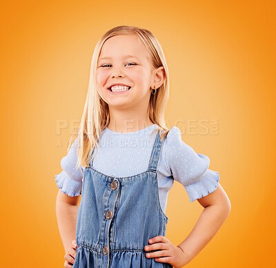 Buy stock photo Happy, cute and portrait of child on orange background with happiness, joy and excited in studio. Fashion, childhood and young girl in trendy outfit, adorable style and summer clothes with smile