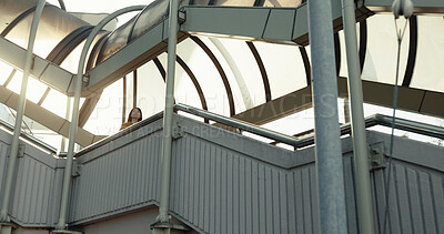 Buy stock photo Stairs, walking and Japanese woman in city for morning commute, travelling and journey in urban town. Sunshine, bridge and person on steps in metro location for adventure, explore and trip in Tokyo