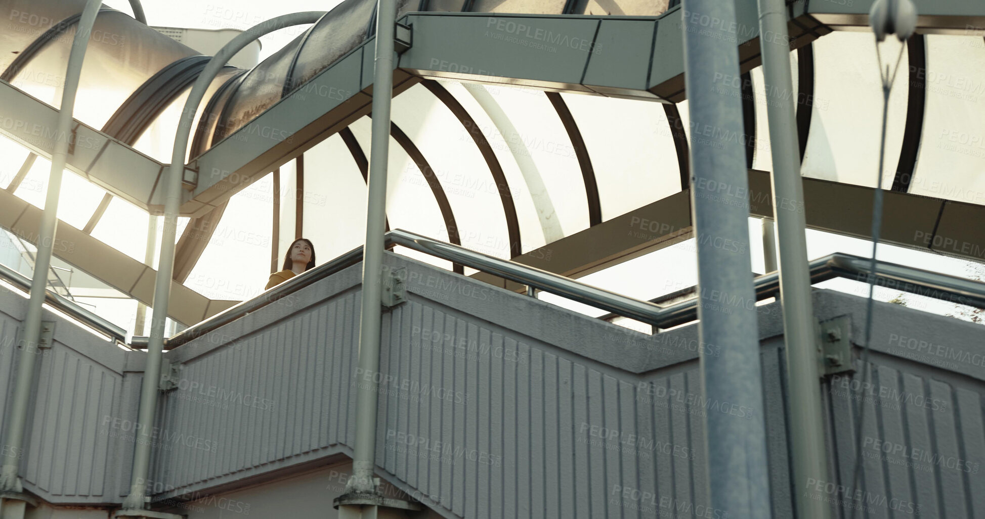 Buy stock photo Stairs, walking and Japanese woman in city for morning commute, travelling and journey in urban town. Sunshine, bridge and person on steps in metro location for adventure, explore and trip in Tokyo