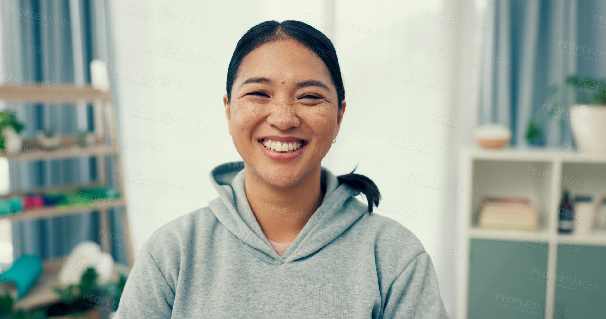 Buy stock photo Portrait, wellness or happy woman in home to relax in living room on holiday in hotel, house or apartment. Face, pride or Asian person with peace, smile or confidence on break to rest for alone time