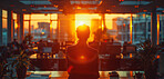 Office, silhouette and business person of people working in cafeteria, boardroom with large windows. Sunset, silhouette and city background for meeting, company and conference in modern times