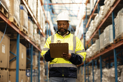Checklist, shipping and man with stock in warehouse reading for ecommerce delivery information. Logistics, clipboard and African industry worker with inventory for package, parcel or boxes in factory