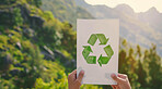 Hand, recycle and volunteer holding a poster for environmental, awareness and sustainability concept. Protest, board and green design with copyspace for Earth Day background, eco system or ecology