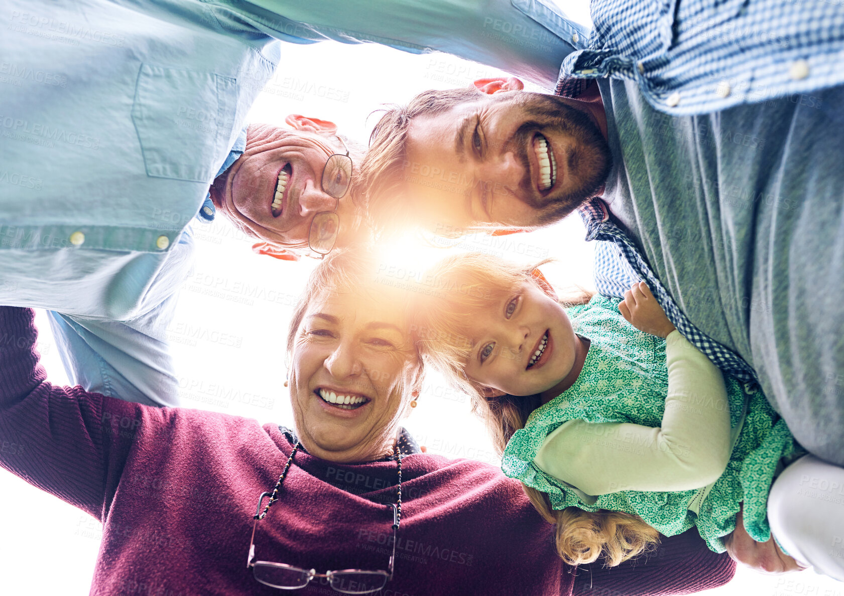 Buy stock photo Outdoors, smile and portrait of family in circle, connection and bonding together or happy people. Grandparents, joyful and father with children on vacation, weekend holiday and from below in Germany