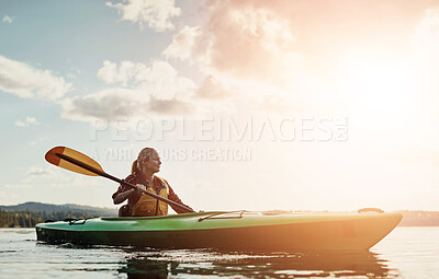 Buy stock photo Lake, sky and woman rowing kayak outdoor for holiday, leisure or vacation in fresh air of nature. Adventure, clouds and travel with happy tourist person in river for break, journey or summer trip