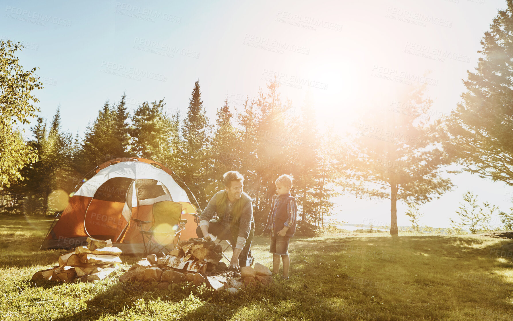 Buy stock photo Family, dad and boy in woods for camping, adventure and holiday for summertime in countryside. Earth, sunshine and people in nature for travel, vacation and together with happy in forest for morning