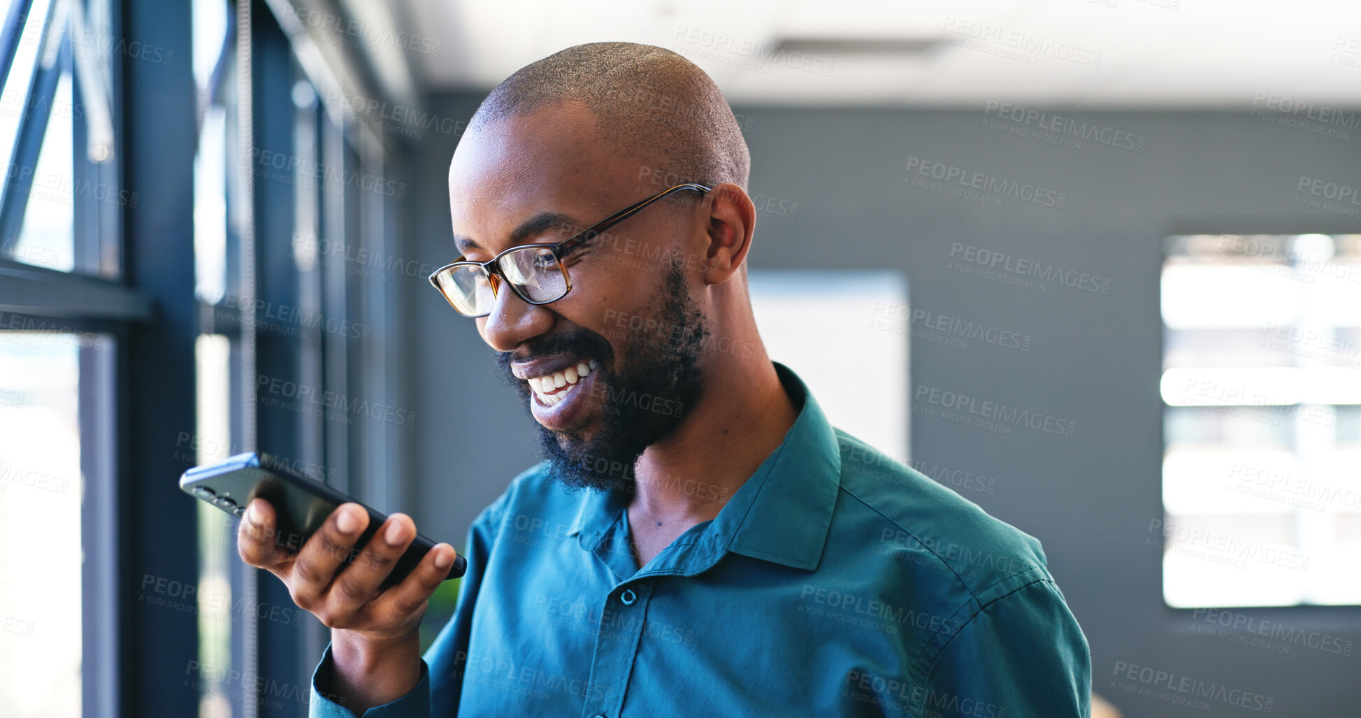 Buy stock photo Phone, voice recognition and businessman in office, audio and app for communication. Smile, tech and professional African male person recording message on call, speaker and conversation in workplace