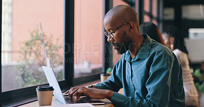 Business, laptop and black man thinking in cafe, idea and typing email for remote work. Dream, vision and freelance professional on computer, serious editor and person writing article in coffee shop