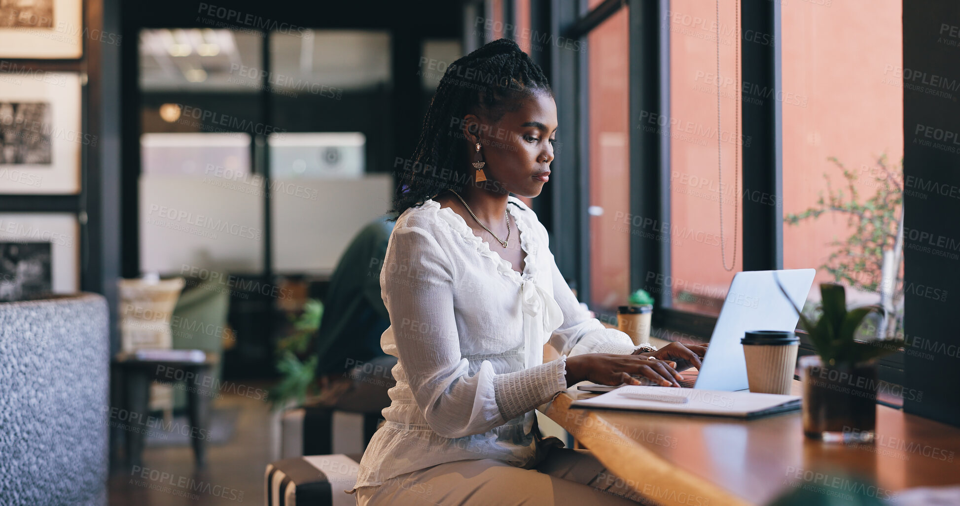 Buy stock photo Woman, laptop and coffee shop or remote work as virtual fashion consultant, communication or email. Black person, typing and brainstorming research for online connection, engagement or social media