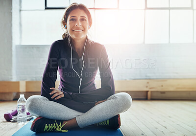 Buy stock photo Portrait, house and girl with yoga mat, earphones and fitness with smile, podcast or exercise. Face, wellness or person in lounge, break or peace with radio, health or listening to music with comfort