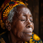 Praying, elderly African and woman. Senior, female and mental or spiritual health concept. Thinking, contentment and peaceful, eyes closed for focus, well being and religious practice or worship