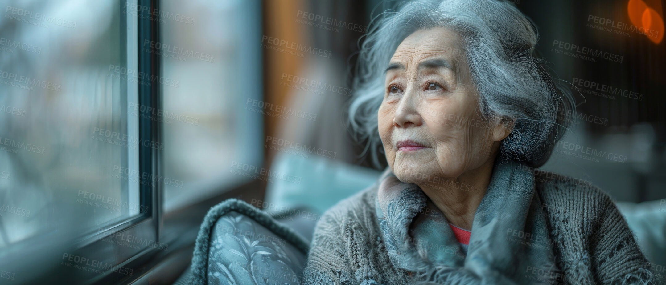 Buy stock photo Thinking, thoughtful and senior Asian woman in retirement home, reflection and remembering past life. Elderly, pensioner and contemplating future or memory, nostalgia sitting on couch with window